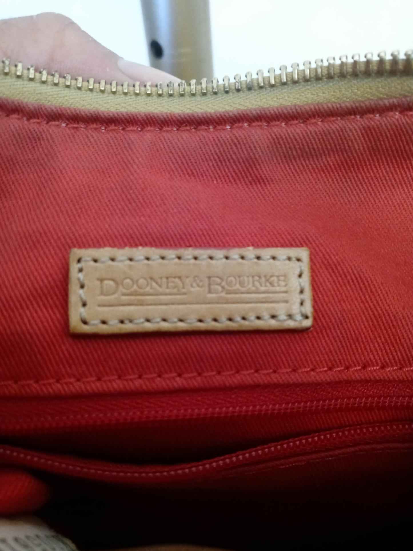 Fabric Dooney & Bourke purse with leather accents