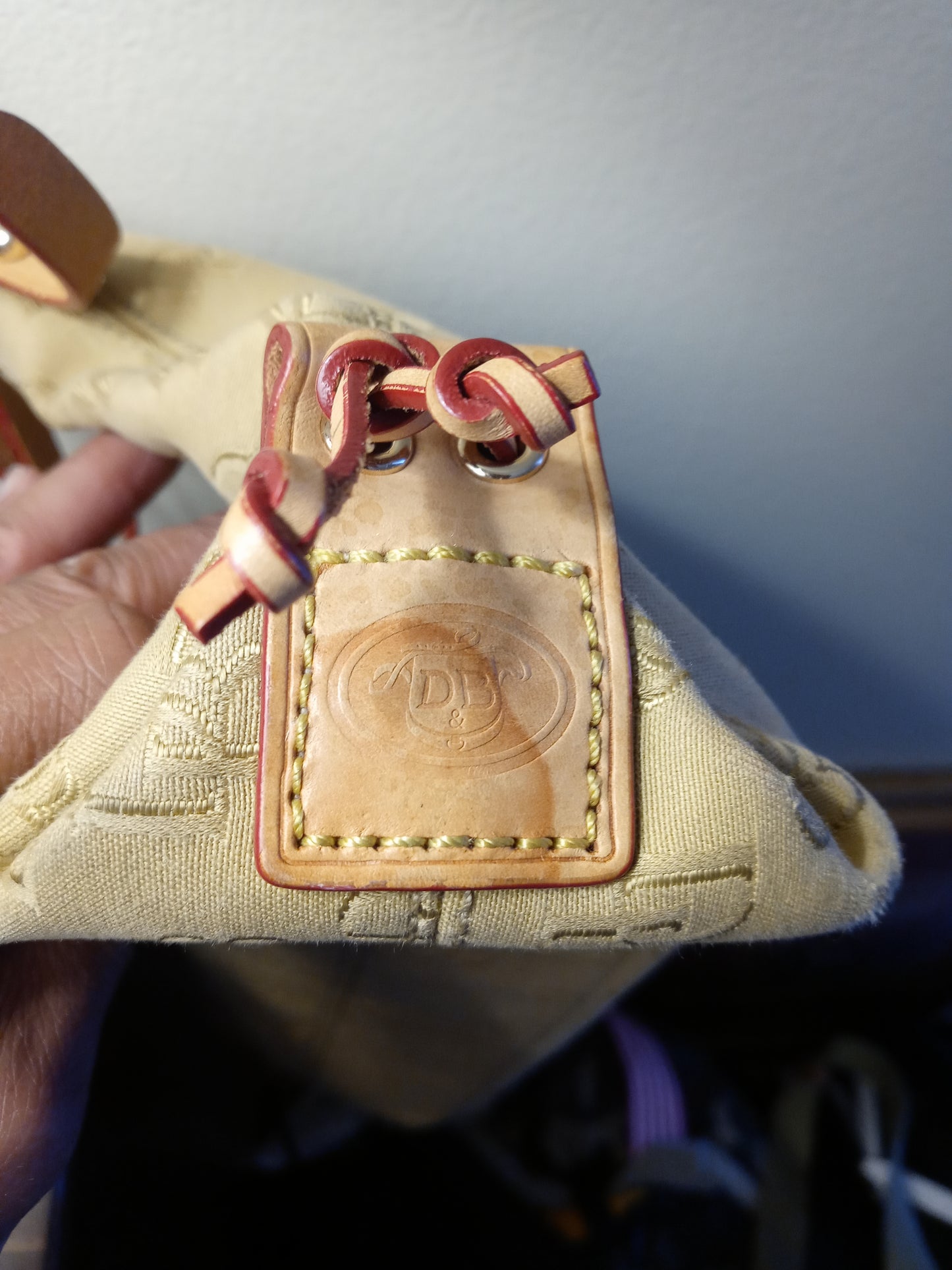 Fabric Dooney & Bourke purse with leather accents