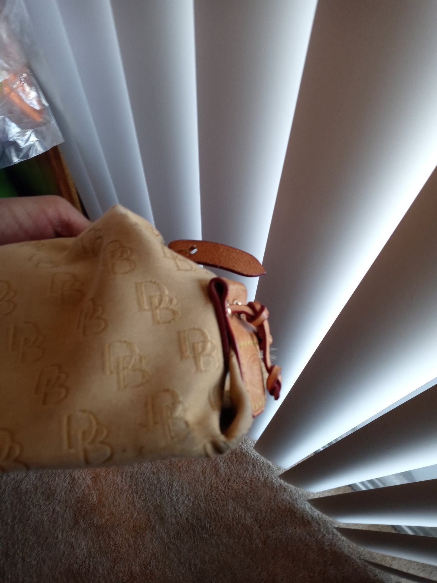 Fabric Dooney & Bourke purse with leather accents
