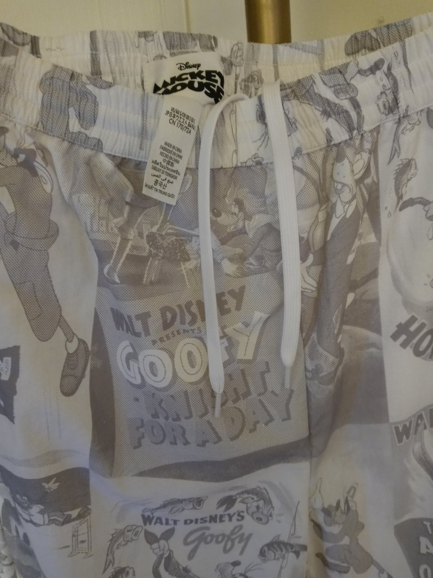 Disney D23 Expo 2022 Exclusive Goofy 90th Anniversary Track Pants Pre Owned - Good Condition Draw String Tie Up Front 2 Zipper Side Pockets 1 Zipper Back Pocket Unisex Size - Small Grey & White