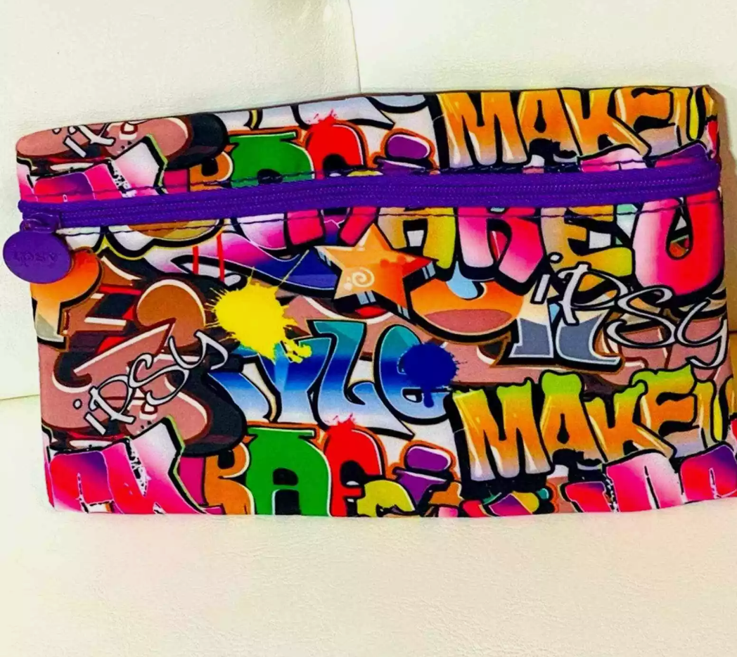 Limited Edition ipsy Small make up bag with all over graffiti print from Ipsy.