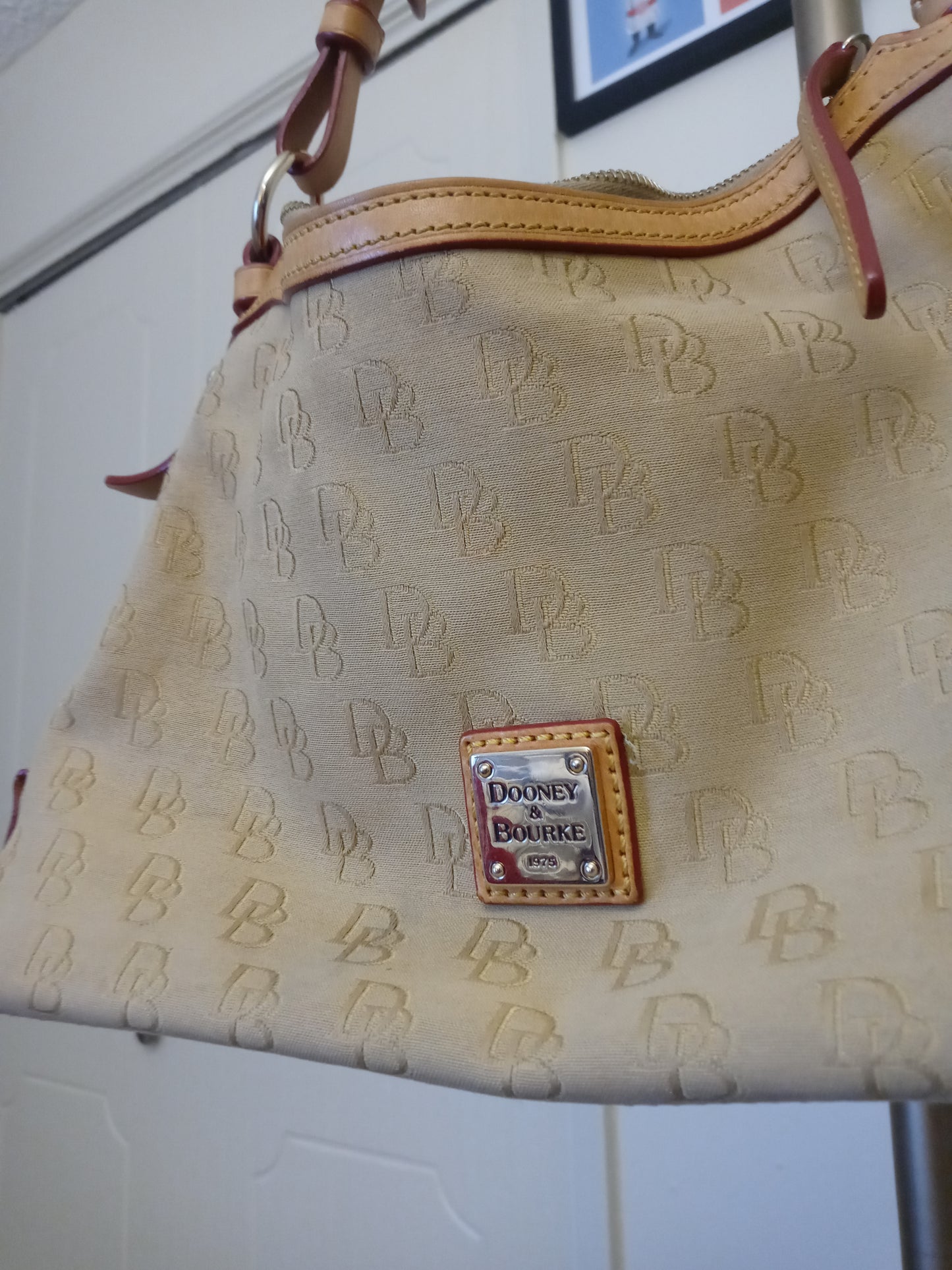 Fabric Dooney & Bourke purse with leather accents