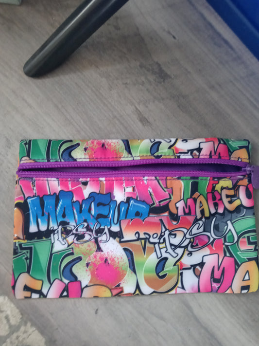 Limited Edition ipsy Small make up bag with all over graffiti print from Ipsy.